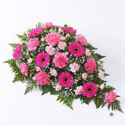 <h2>Classic Large Teardrop Spray in Pink | Funeral Flowers</h2>
<ul>
<li>Approximate Size W 45cm H 75cm</li>
<li>Hand created large pink spray in fresh flowers</li>
<li>To give you the best we may occasionally need to make substitutes</li>
<li>Funeral Flowers will be delivered at least 2 hours before the funeral</li>
<li>For delivery area coverage see below</li>
</ul>
<br>
<h2>Liverpool Flower Delivery</h2>
<p>We have a wide selection of Funeral Sprays offered for Liverpool Flower Delivery. Funeral Sprays can be provided for you in Liverpool, Merseyside and we can organize Funeral flower deliveries for you nationwide. Funeral Flowers can be delivered to the Funeral directors or a house address. They can not be delivered to the crematorium or the church.</p>
<br>
<h2>Flower Delivery Coverage</h2>
<p>Our shop delivers funeral flowers to the following Liverpool postcodes L1 L2 L3 L4 L5 L6 L7 L8 L11 L12 L13 L14 L15 L16 L17 L18 L19 L24 L25 L26 L27 L36 L70 If your order is for an area outside of these we can organise delivery for you through our network of florists. We will ask them to make as close as possible to the image but because of the difference in stock and sundry items it may not be exact.</p>
<br>
<h2>Liverpool Funeral Flowers | Sprays</h2>
<p>This traditional large teardrop-shaped spray has been loving handcrafted by our expert florists in varying shades of pink. It includes bright cerise germini plus light and dark pink carnations. These fresh flowers are carefully arranged and interspersed with white gypsophila, leather leaf and eucalyptus to create this teardrop-shaped spray.</p>
<br>
<p>Funeral sprays are created in a teardrop shape and are sometimes called teardrop sprays. The flowers are arranged in floral foam, which means the flowers have a water source.</p>
<br>
<p>They are an appropriate arrangement expressing sympathy if you are family, friend or colleague of the deceased.</p>
<br>
<p>We recommend these rather than a funeral sheaf as the flowers are still drinking, so protected against wilting, especially when the funeral is held in the heat.</p>
<br>
<p>Contains 12 cerise carnations, 9 pink germini, 3 white gypsophila, 7 pink spray carnations and mixed foliage.</p>
<br>
<h2>Best Florist in Liverpool</h2>
<p>Trust Award-winning Liverpool Florist, Booker Flowers and Gifts, to deliver funeral flowers fitting for the occasion delivered in Liverpool, Merseyside and beyond. Our funeral flowers are handcrafted by our team of professional fully qualified who not only lovingly hand make our designs but hand-deliver them, ensuring all our customers are delighted with their flowers. Booker Flowers and Gifts your local Liverpool Flower shop.</p>
<br>
<p><em>Janice Crane - 5 Star Review on Google - Funeral Florist Liverpool</em></p>
<br>
<p><em>I recently had to order a floral tribute for my sister in laws funeral and the Booker Flowers team created a beautifully stunning arrangement. Thank you all so much, Janice Crane.</em></p>
<br>